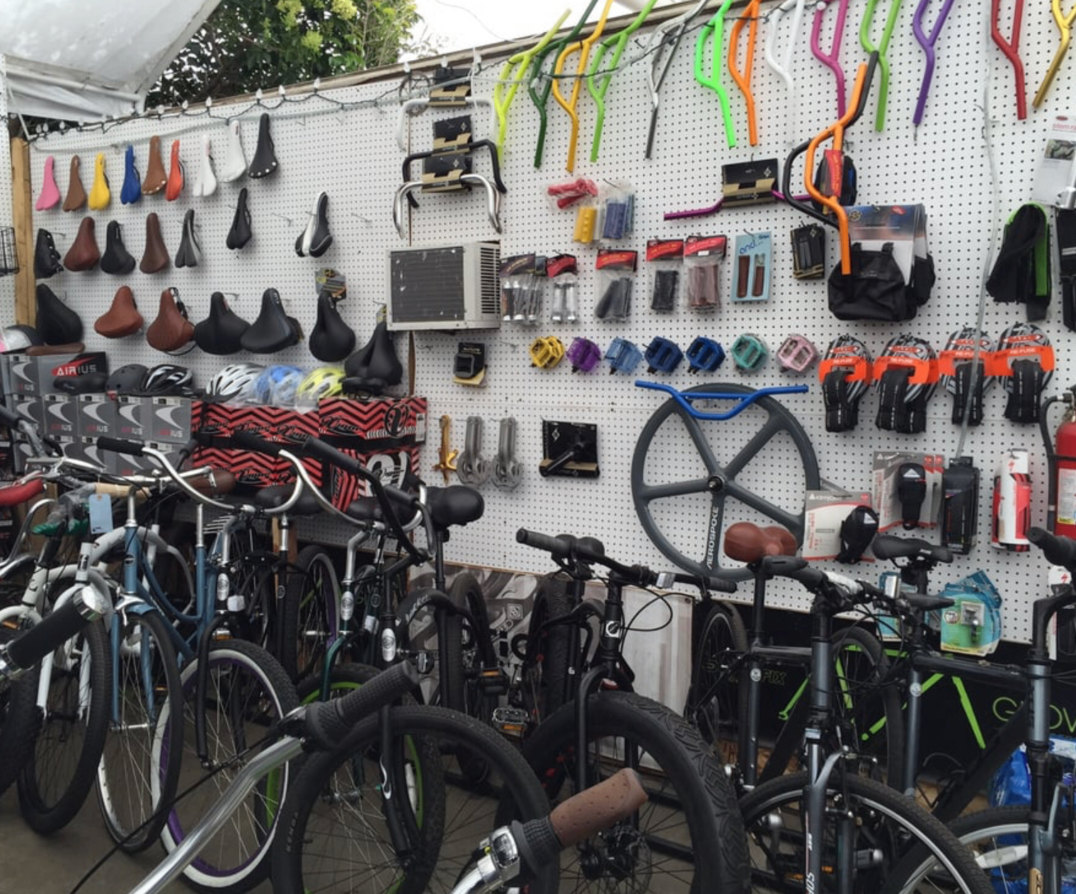 Row of colorful beach cruiser rentals along Venice boardwalk